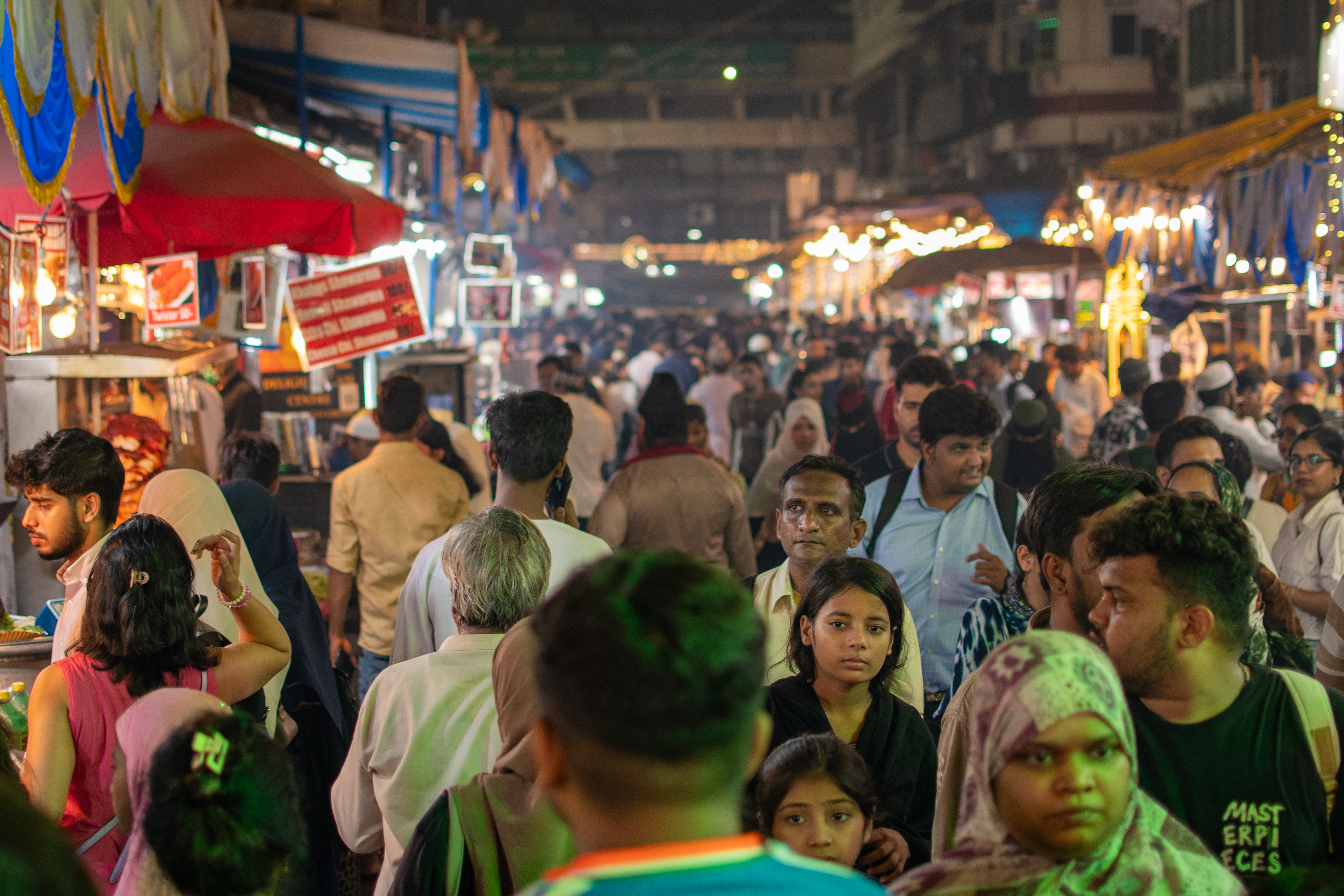 Mohammed Ali Road in full gear - hundreds of people eating and moving through the lit street